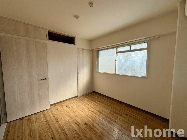 パールマンションの寝室|落ち着いた色調の寝室です