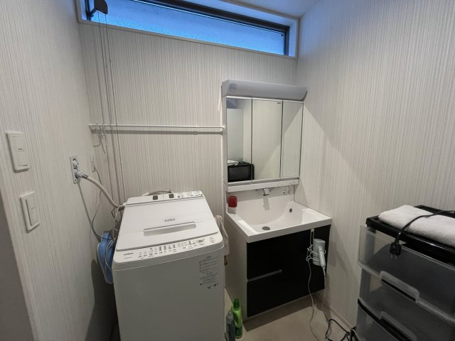 日南市飫肥地区　インナーガレージ付きのコンパクトな間取りの住宅です！の洗面所