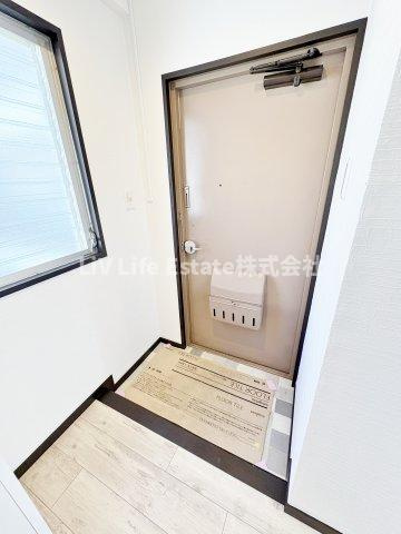 エスカイア久米川の玄関