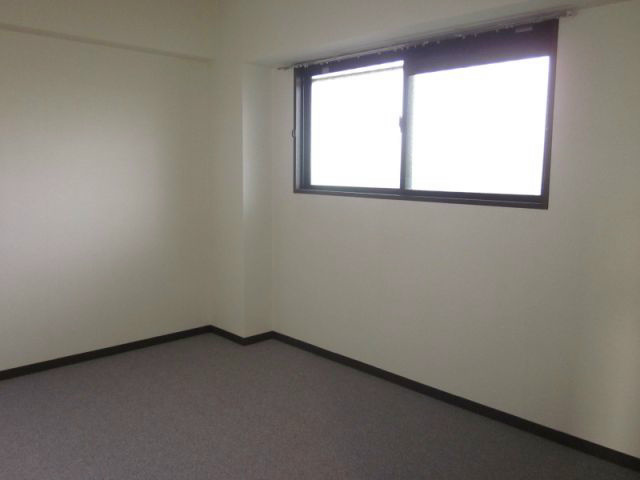 タキマツ第５マンションの寝室