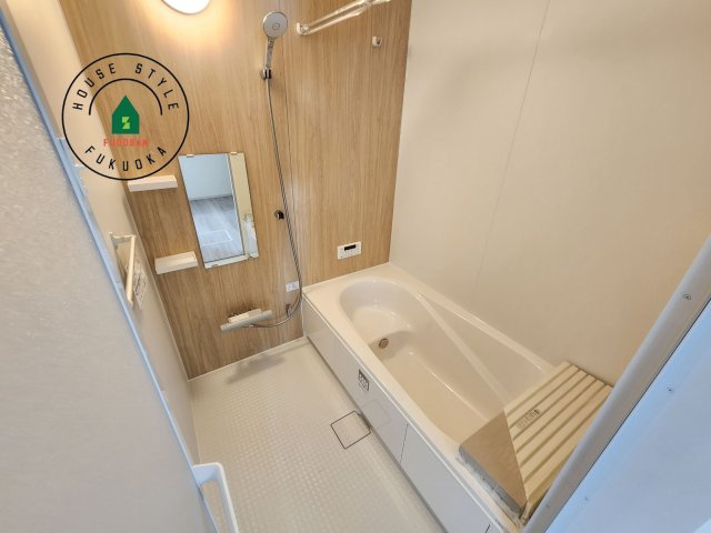 糸島市高田2丁目第2-1棟（1号棟）の内観：施工例|1日の疲れを癒してくれる広々バスルーム。雨の日のお洗濯にも大活躍な浴室乾燥機付です！
