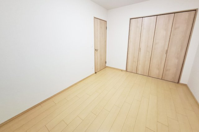 ヴューイスト泉ヶ丘の寝室|洋室1