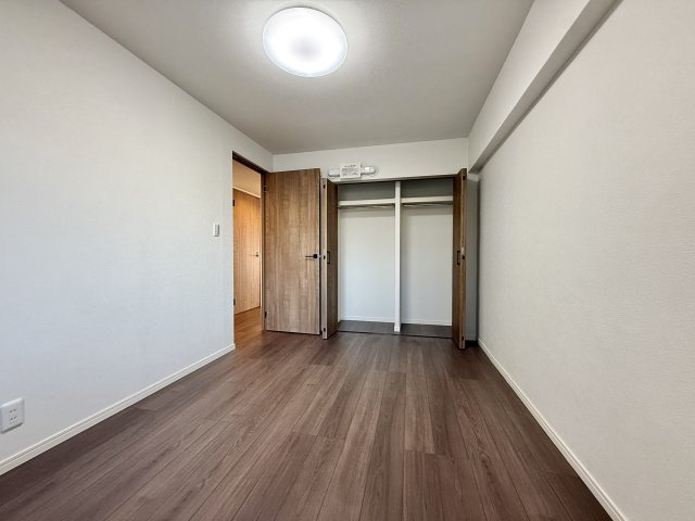 コープ野村八事の洋室