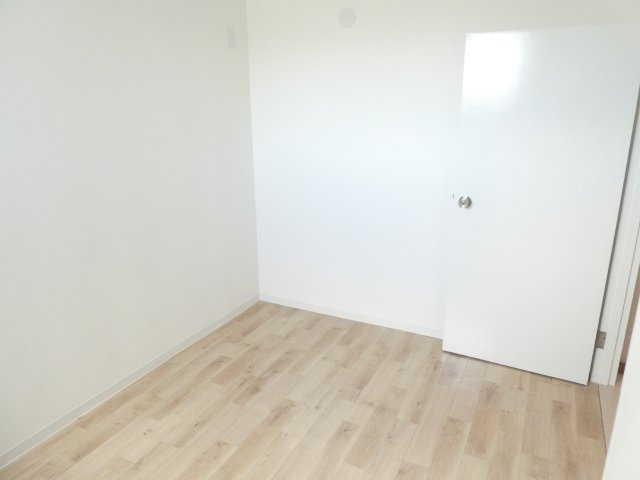 中州テラスハウスの寝室