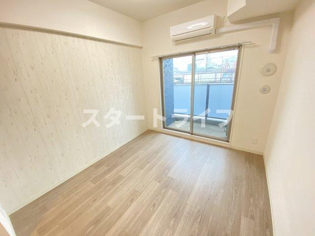 大阪市淀川区西三国２丁目の賃貸マンションの居間・リビング