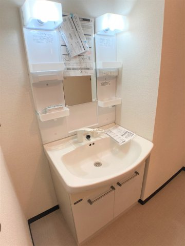 コープ野村半田壱号棟の洗面所