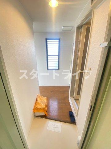 大阪市東淀川区淡路１丁目の賃貸マンションの玄関