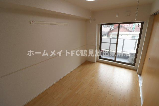 大阪市城東区諏訪４丁目のハイツの洋室