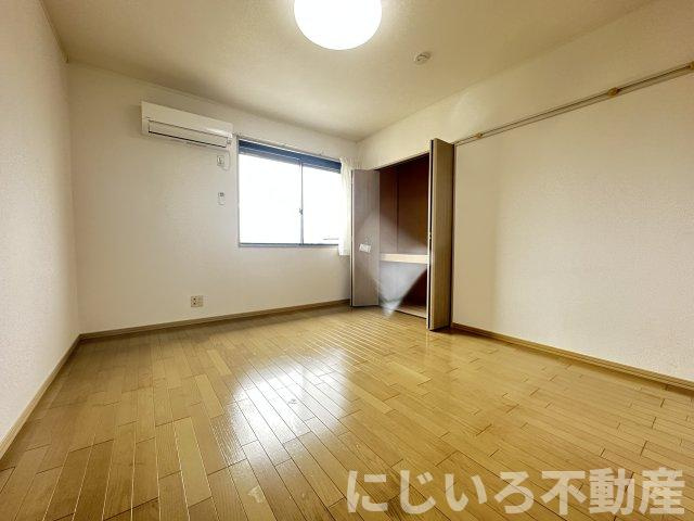 エスパシオ那賀川Bの居間・リビング
