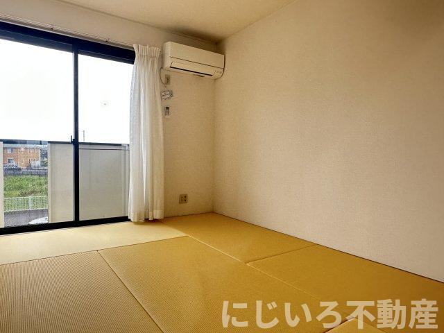 エスパシオ那賀川Bの居間・リビング