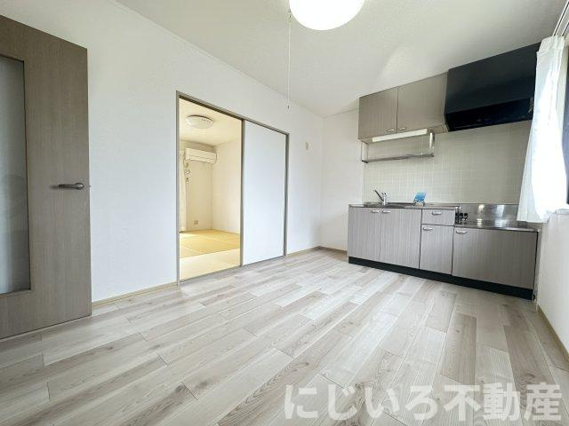 エスパシオ那賀川Bの居間・リビング