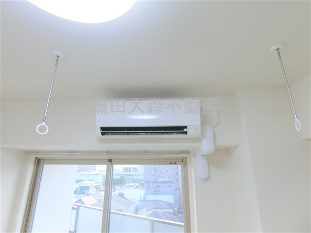 ジェノヴィア蒲田Ⅱスカイガーデンの設備|エアコン　室内物干し