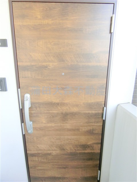 ジェノヴィア蒲田Ⅱスカイガーデンの玄関