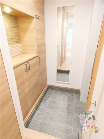 エステイ学南町の玄関