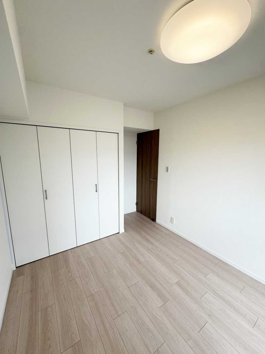 グランベルフォーシーズンズタワーの洋室