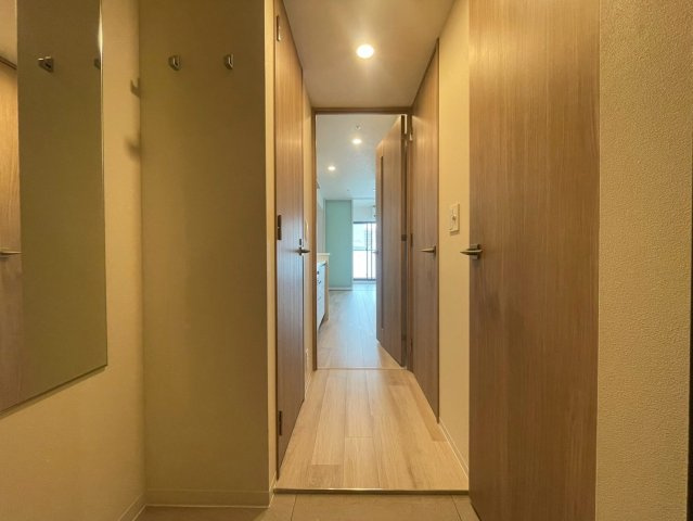 コンフォリア・リヴ本町WEST　Qの玄関