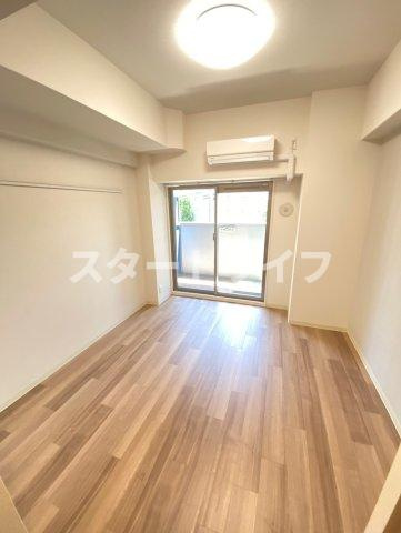 大阪市淀川区西中島１丁目の賃貸マンションの居間・リビング