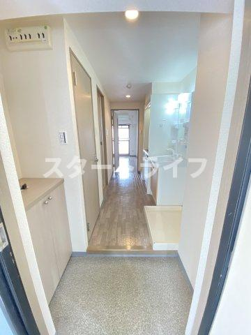 大阪市淀川区木川西３丁目の賃貸マンションの玄関