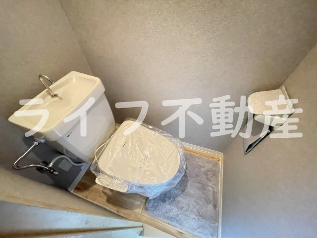 シャトレ小阪のトイレ|落ち着いた色調のトイレです
