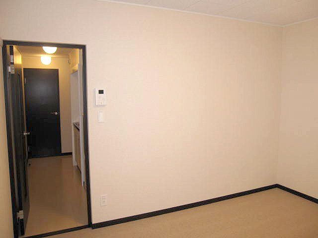 レオネクストスクウェア　ワンの居間・リビング