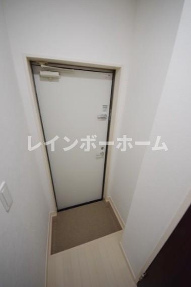 シャンテ四ツ木駅前の玄関