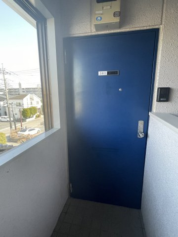 ロイヤルコーポ高野台の玄関