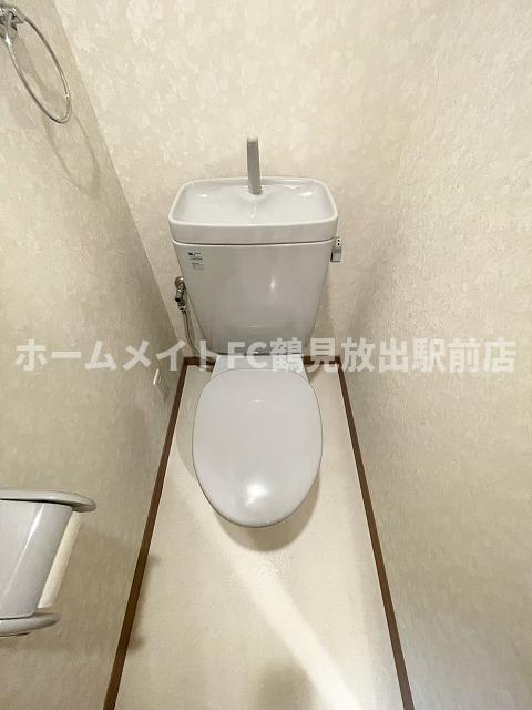 大阪市鶴見区放出東３丁目の賃貸マンションのトイレ