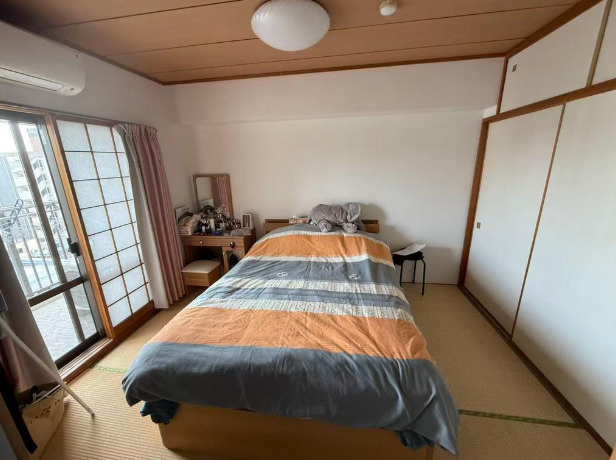 サンヴェール伊勢佐木町の和室|6帖の和室のなります。リビングに隣接の間仕切りを解放することでさらに広いリビングスペースとなります。