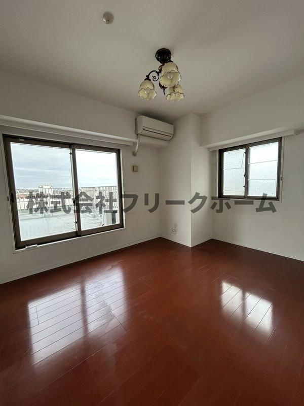 三鷹市井口１丁目の賃貸マンションの寝室