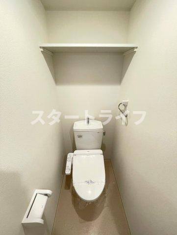 大阪市東淀川区西淡路１丁目の賃貸マンションのトイレ