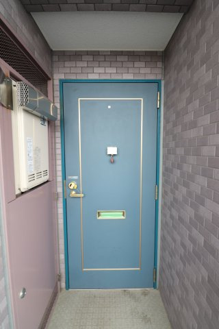 コンフォール生田の玄関
