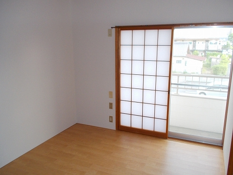 コーポIWASAの居間・リビング