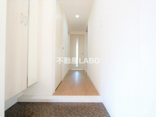 グランデカワノ真田山の玄関