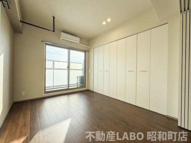 Broad阿倍野阪南町Residenceの洋室