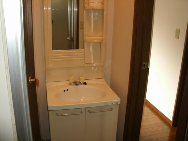 高田戸建の洗面所| 