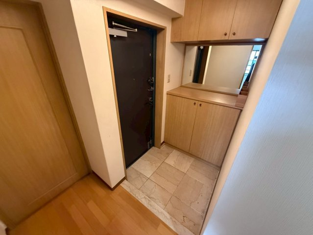 サンビルダー北野弐番館の玄関