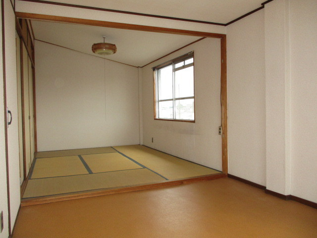 北葛城郡上牧町桜ケ丘１丁目の住宅付店舗戸建の寝室