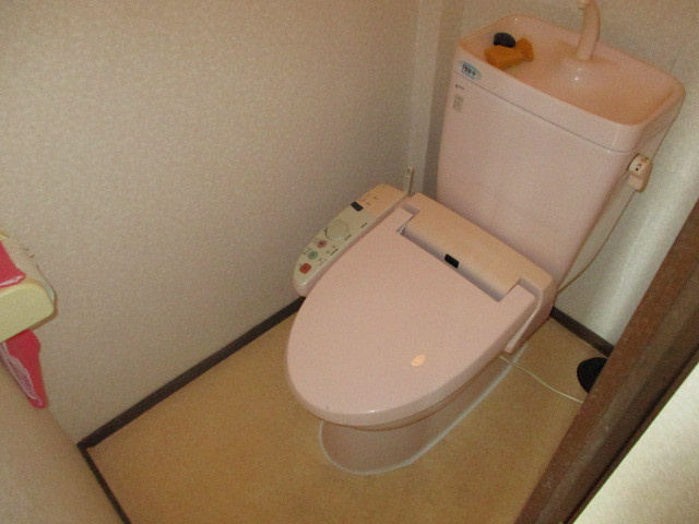 北葛城郡上牧町桜ケ丘１丁目の住宅付店舗戸建のトイレ