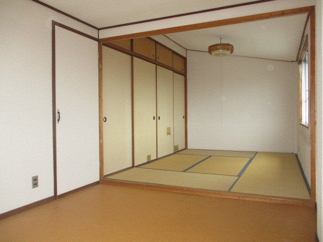 北葛城郡上牧町桜ケ丘１丁目の住宅付店舗戸建の寝室