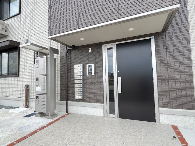 ウェスタ古閑中のエントランス