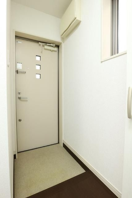 サンライズ・カーサ南大塚の玄関