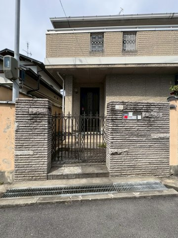 千里丘上貸家のエントランス