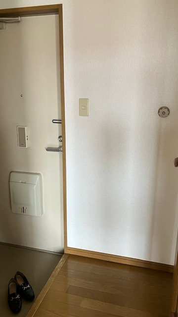 キャニオン十和田A棟の玄関