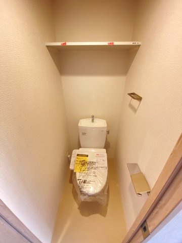 大阪市東淀川区東中島２丁目の賃貸マンションのトイレ