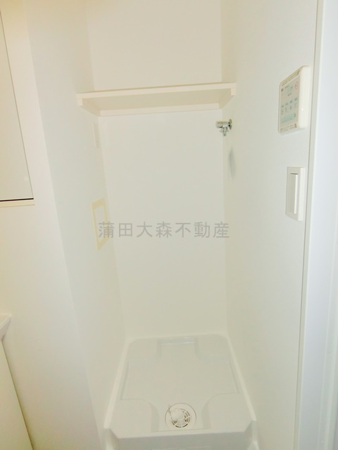 ルネコート大鳥居の設備|棚付きの洗濯機置き場