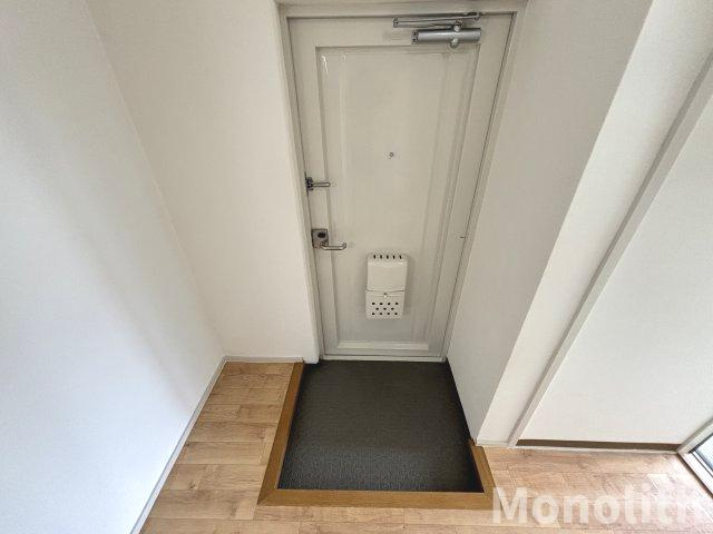 鶴山台59号棟の玄関