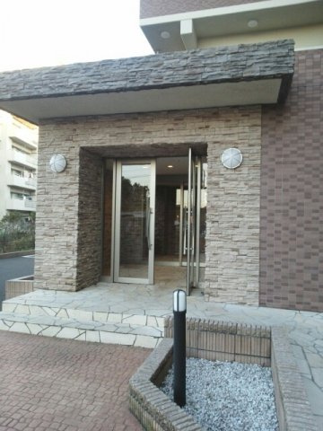 オリーブ　コート塚田のエントランス