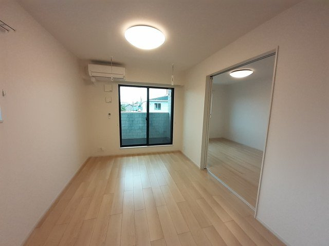 メゾン　グレーヌ　塩屋Ａの居間・リビング