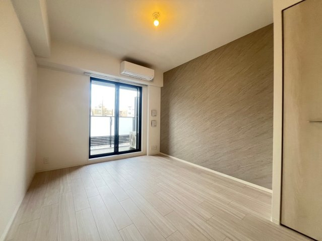 コンフォリア新大阪宮原Qの居間・リビング