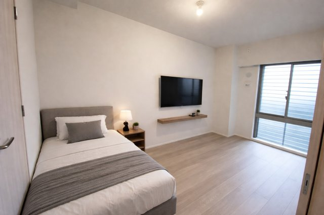 【民泊可能】ブランシエラ那覇開南プレミストの居間・リビング